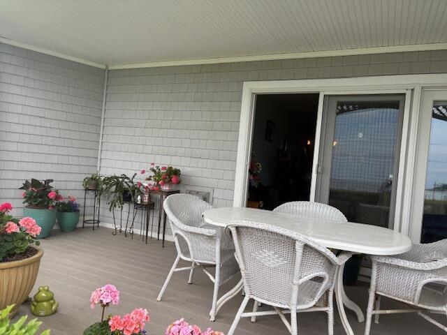 31 Ocean Ave Unit 105, York, ME 03909 - wooden deck with outdoor dining space
