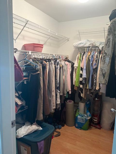 31 Ocean Ave Unit 105, York, ME 03909 - walk in closet featuring wood finished floors