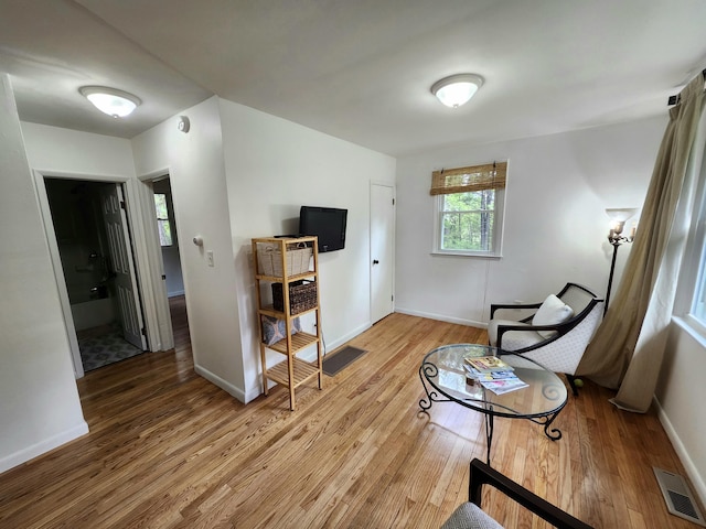 567 Ossipee Trl W, Standish, ME 04084 - sitting room featuring wood finished floors and baseboards