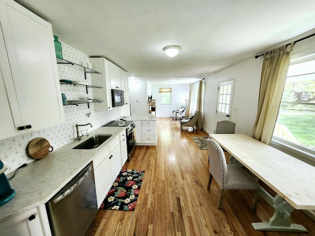 567 Ossipee Trl W, Standish, ME 04084 - kitchen with range with electric stovetop, stainless steel dishwasher, black microwave, a sink, and open shelves