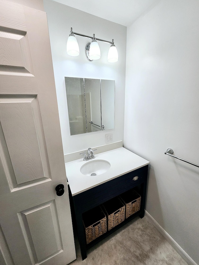 567 Ossipee Trl W, Standish, ME 04084 - bathroom featuring vanity and baseboards