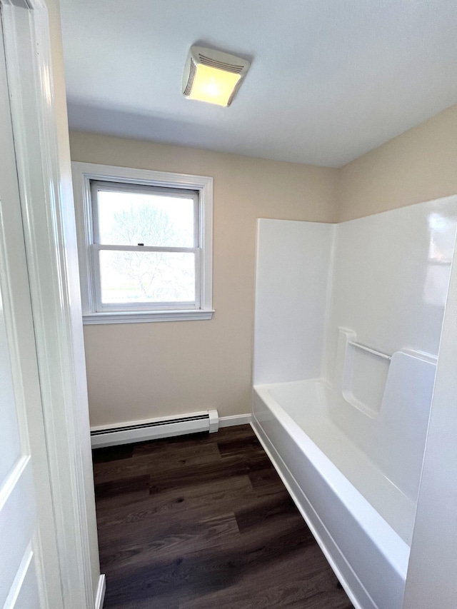 162 Beach St Unit 3, Saco, ME 04072 - bathroom featuring a baseboard radiator, a tub, wood finished floors, a shower, and baseboards
