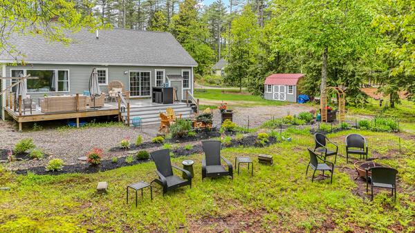 4 Dragonfly Cir, Limerick, ME 04048 - rear view of house featuring a deck