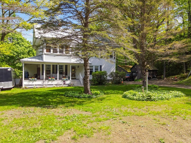 103 Taylor Woods Rd, Belgrade, ME 04917 - view of front of property featuring a porch and a front lawn