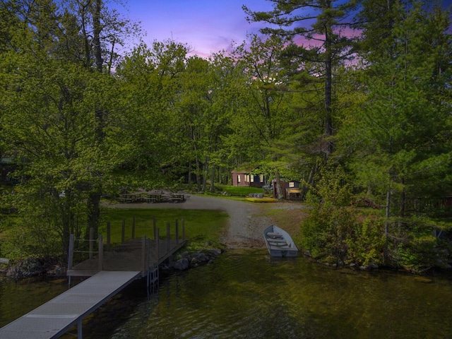 103 Taylor Woods Rd, Belgrade, ME 04917 - dock area featuring a wooded view and a water view