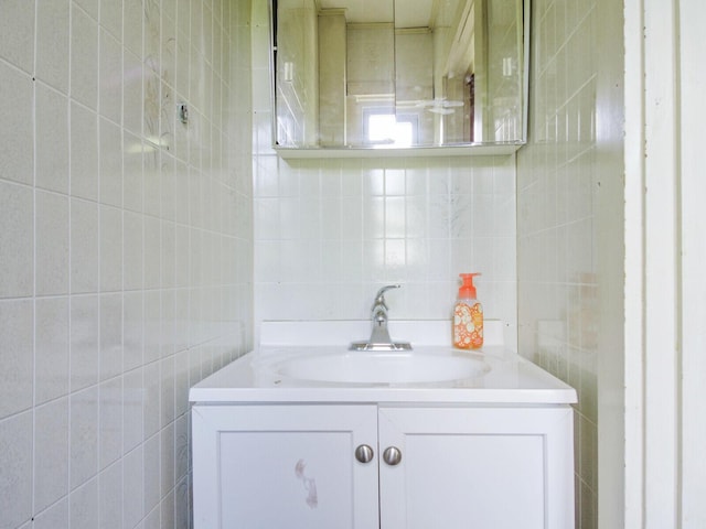 103 Taylor Woods Rd, Belgrade, ME 04917 - bathroom with tile walls and vanity