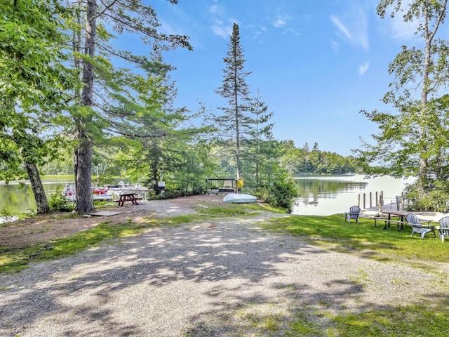 103 Taylor Woods Rd, Belgrade, ME 04917 - view of dirt / gravel driveway with a water view