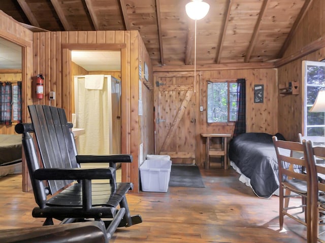 103 Taylor Woods Rd, Belgrade, ME 04917 - bedroom with wood ceiling, wooden walls, and wood-type flooring