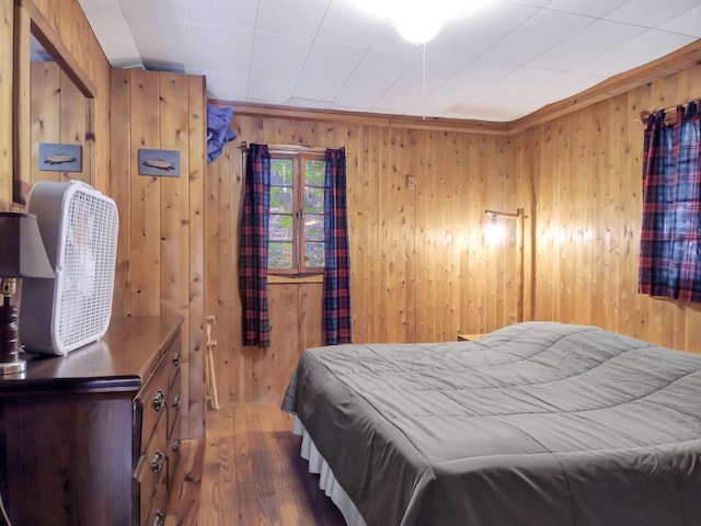 103 Taylor Woods Rd, Belgrade, ME 04917 - bedroom featuring wood finished floors and wooden walls