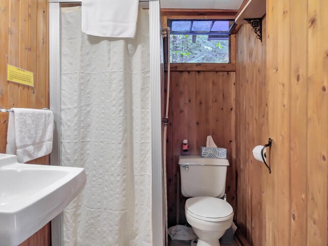 103 Taylor Woods Rd, Belgrade, ME 04917 - full bath featuring wood walls and curtained shower