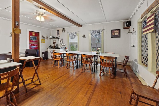 103 Taylor Woods Rd, Belgrade, ME 04917 - dining space with wood-type flooring, ornamental molding, a ceiling fan, and beamed ceiling