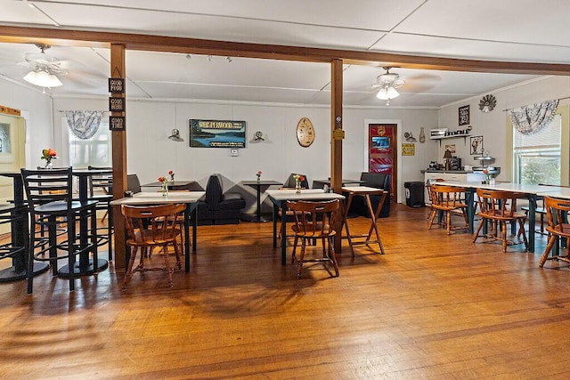 103 Taylor Woods Rd, Belgrade, ME 04917 - dining area featuring ceiling fan, wood-type flooring, and crown molding