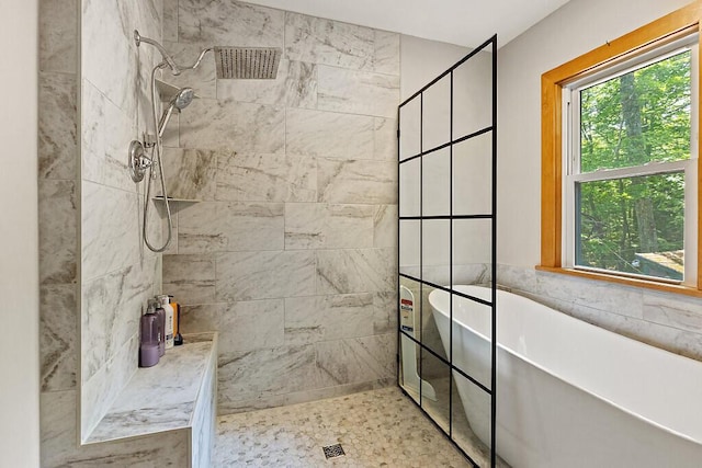 103 Taylor Woods Rd, Belgrade, ME 04917 - bathroom with plenty of natural light, a freestanding tub, and walk in shower