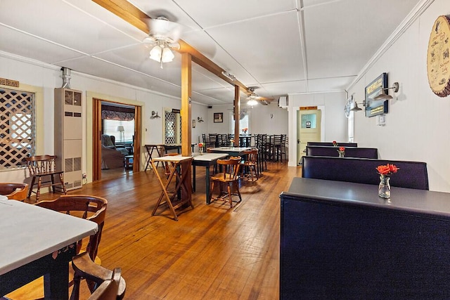 103 Taylor Woods Rd, Belgrade, ME 04917 - dining area with ceiling fan, wood finished floors, and crown molding