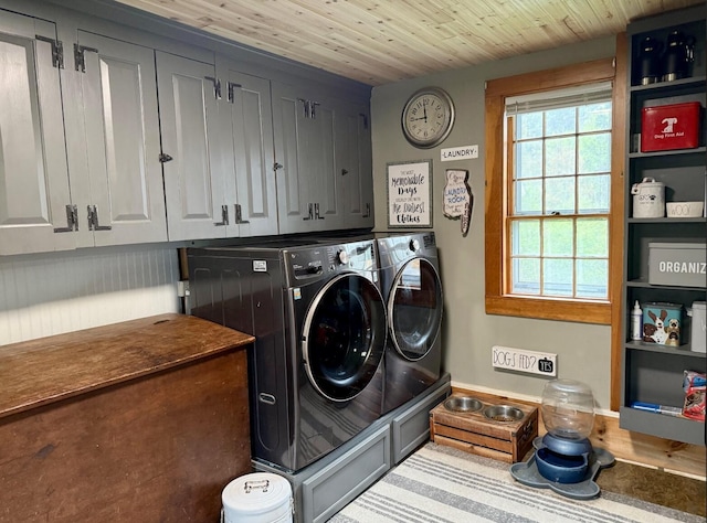 2103 US Highway 1, Sullivan, ME 04664 - laundry area with independent washer and dryer, cabinet space, and wood ceiling