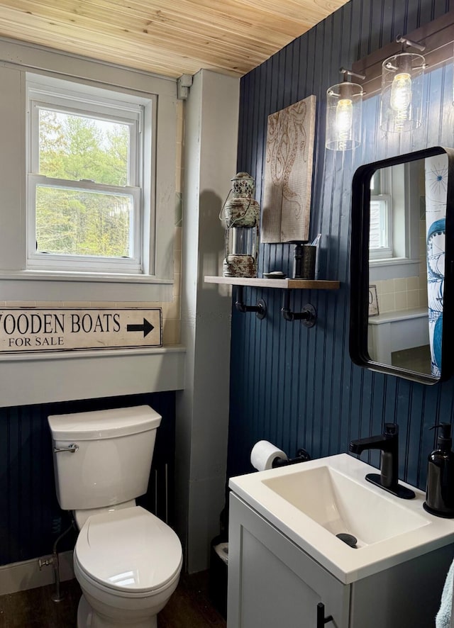 2103 US Highway 1, Sullivan, ME 04664 - half bathroom with toilet, wooden ceiling, and vanity