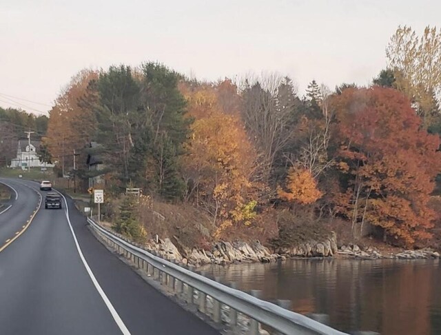 2103 US Highway 1, Sullivan, ME 04664 - view of asphalt road with traffic signs and a water view