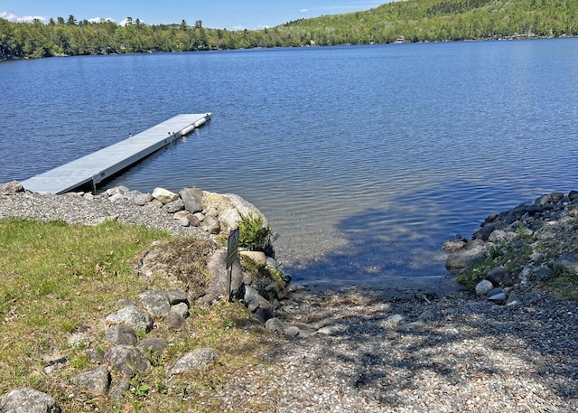 861 W Shore Rd, Otis, ME 04605 - dock area featuring a water view and a forest view