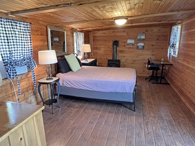 861 W Shore Rd, Otis, ME 04605 - bedroom with wooden ceiling, wood walls, hardwood / wood-style floors, and a wood stove