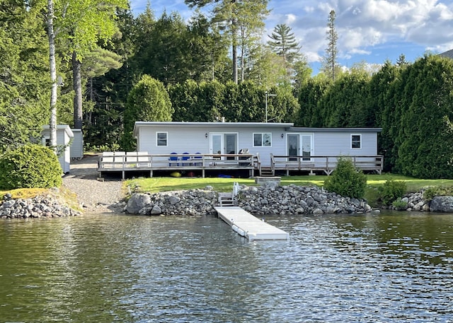 861 W Shore Rd, Otis, ME 04605 - rear view of house with a deck with water view and french doors