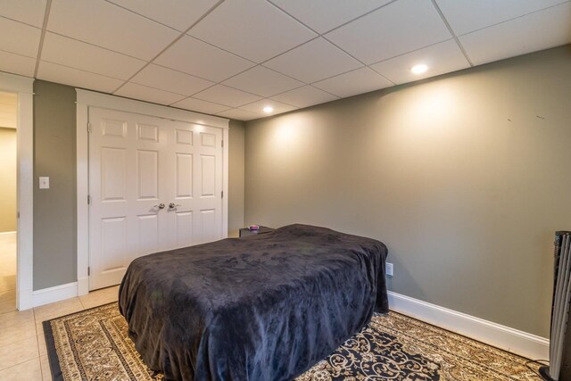 231 Parkway S, Brewer, ME 04412 - bedroom featuring recessed lighting, baseboards, a drop ceiling, light tile patterned flooring, and a closet