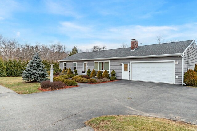 231 Parkway S, Brewer, ME 04412 - ranch-style home with a garage, driveway, a chimney, and a shingled roof