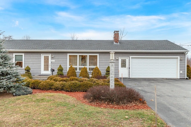 231 Parkway S, Brewer, ME 04412 - single story home featuring a chimney, asphalt driveway, an attached garage, a shingled roof, and a front lawn