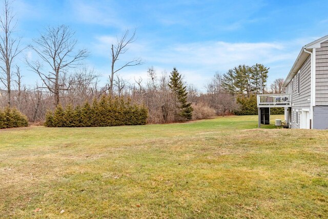 231 Parkway S, Brewer, ME 04412 - view of green lawn with a deck