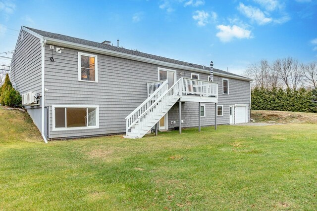 231 Parkway S, Brewer, ME 04412 - back of house with stairs, a deck, a yard, and a garage
