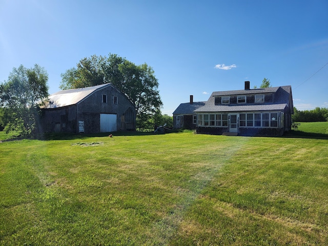 1542 Moosehead Trail Highway, Plymouth, ME 04969 - view of grassy yard with an outdoor structure and a barn