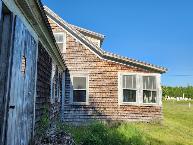 1542 Moosehead Trail Highway, Plymouth, ME 04969 - view of side of home with a yard
