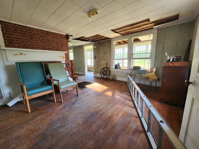 1542 Moosehead Trail Highway, Plymouth, ME 04969 - living area featuring hardwood / wood-style flooring and a baseboard heating unit