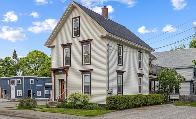 151 Birch St Unit A, B, Bangor, ME 04401 - view of front of property with a chimney, entry steps, and a shingled roof