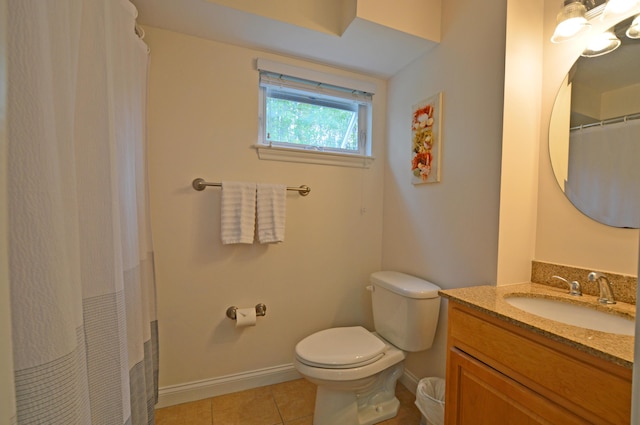 272 Mills Rd Unit 7C, Kennebunkport, ME 04046 - bathroom with toilet, vanity, tile patterned flooring, and baseboards
