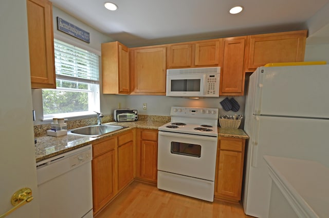 272 Mills Rd Unit 7C, Kennebunkport, ME 04046 - kitchen featuring white appliances, a sink, light wood-style floors, recessed lighting, and light stone countertops