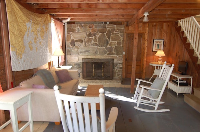 14 Auditorium Park, Northport, ME 04849 - living area with stairs, a stone fireplace, and beamed ceiling