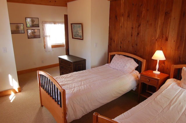 14 Auditorium Park, Northport, ME 04849 - bedroom with carpet flooring, wooden walls, and baseboards