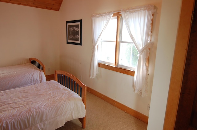 14 Auditorium Park, Northport, ME 04849 - carpeted bedroom featuring lofted ceiling and baseboards