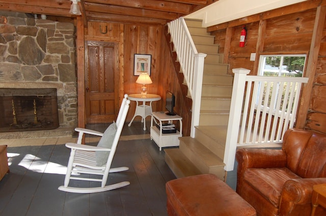 14 Auditorium Park, Northport, ME 04849 - staircase with wood walls, hardwood / wood-style floors, and a fireplace