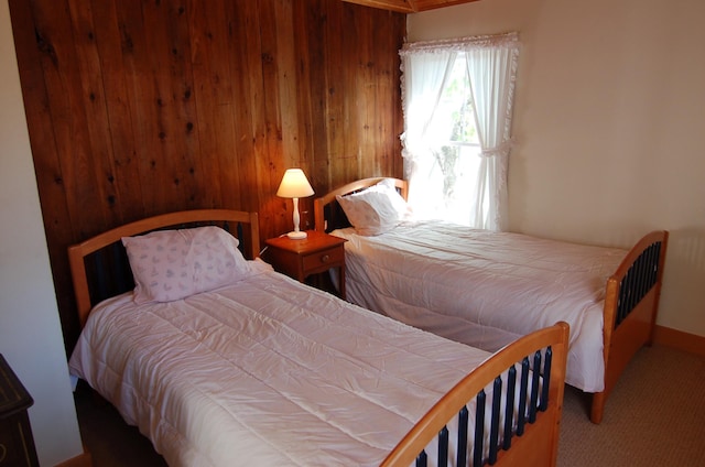 14 Auditorium Park, Northport, ME 04849 - bedroom featuring wooden walls, carpet flooring, and baseboards
