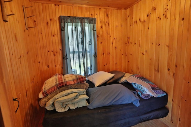 50 Hook Ln, Frenchtown Twp, ME 04441 - bedroom featuring wooden walls