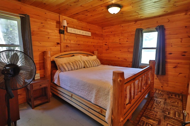 50 Hook Ln, Frenchtown Twp, ME 04441 - bedroom featuring multiple windows, wood walls, and wooden ceiling