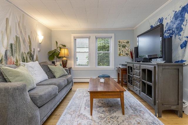 52 Pleasant St, North Berwick, ME 03906 - living room with crown molding, a baseboard radiator, and light wood finished floors