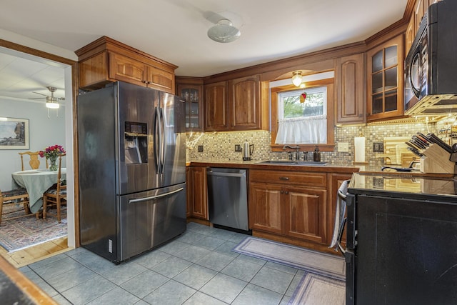 52 Pleasant St, North Berwick, ME 03906 - kitchen with black appliances, a sink, tasteful backsplash, dark countertops, and ceiling fan