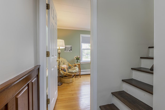 52 Pleasant St, North Berwick, ME 03906 - stairway featuring hardwood / wood-style floors and crown molding