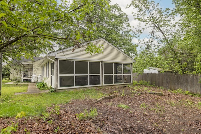 52 Pleasant St, North Berwick, ME 03906 - back of house featuring a sunroom