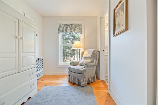 18 Scenic View Dr, Naples, ME 04055 - sitting room with light wood finished floors and baseboards