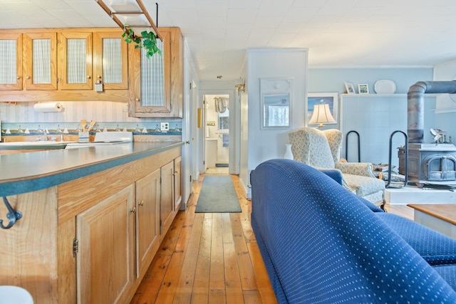 18 Scenic View Dr, Naples, ME 04055 - kitchen with a wood stove and light wood finished floors