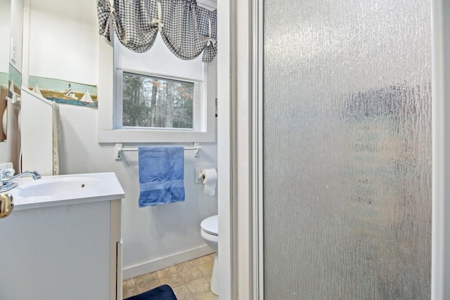 18 Scenic View Dr, Naples, ME 04055 - full bath featuring vanity, toilet, a shower, and baseboards