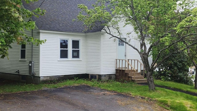14 Highland Ave, Augusta, ME 04330 - view of side of home with roof with shingles